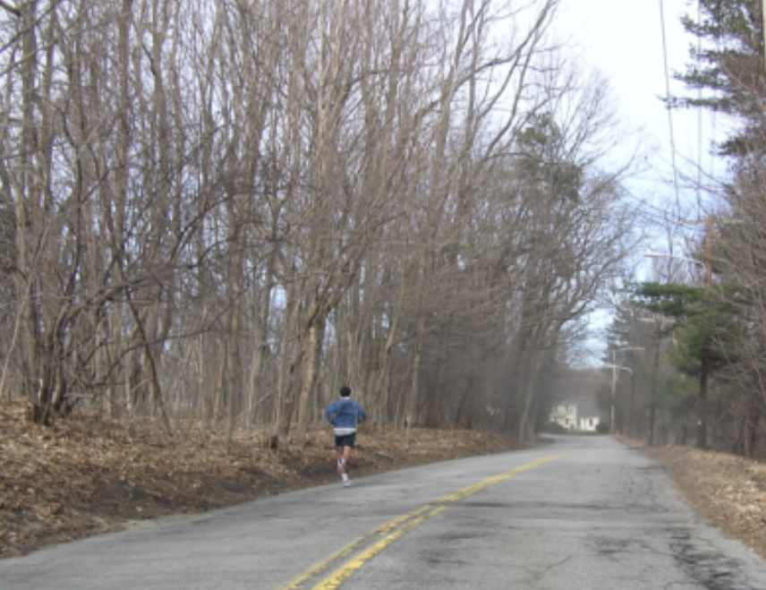 Historic Ware House (ca. 1720) is seen at the foot of Scenic Brookside Road